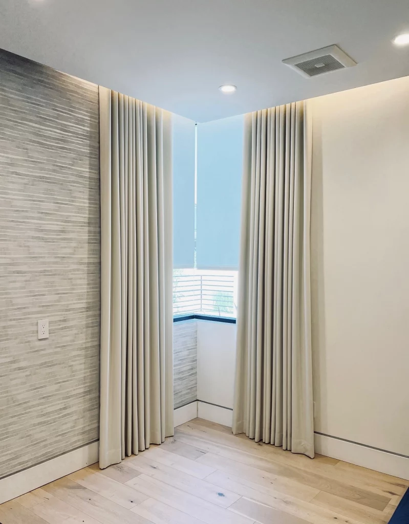 roller shade down + drapes open